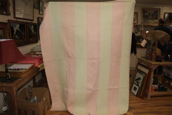 A rose pink and light pink reversible quilt, another reversible with yellow, the other mint green gingham and pink (3)
